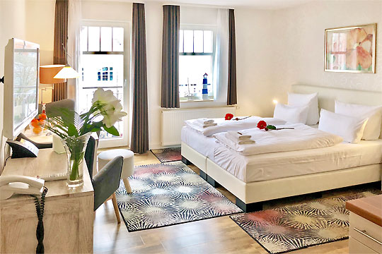 Einraumappartement mit Doppelbett und Balkon Einraumappartement mit Doppelbett und Balkon
